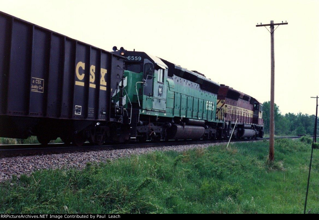 Helpers shove all-rail ore loads east